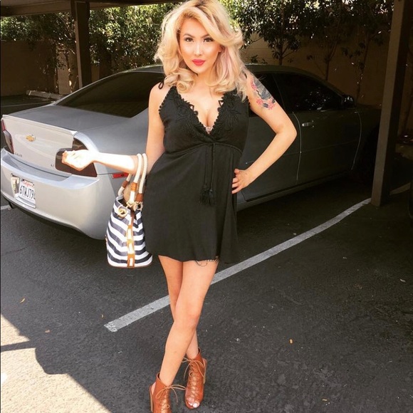 Fashion Nova Dresses & Skirts - 3/25 Fashion Nova black romper